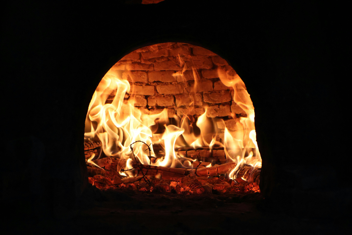 Industrial brick furnace burning at high temperature, representing Lumara's energy products range